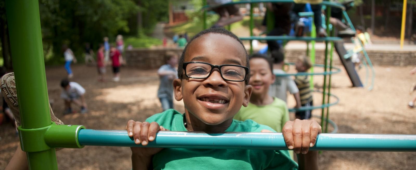 Canva - Boy in Green Crew Neck T-shirt Wearing Black Framed Eyeglasses